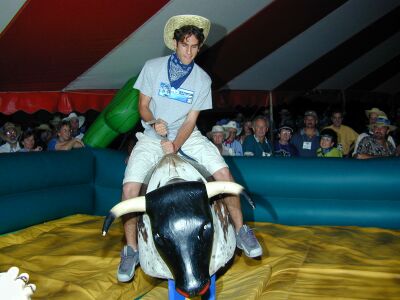 Bull riding wannabe Rotarians got their chance to last 8-seconds aboard this machine