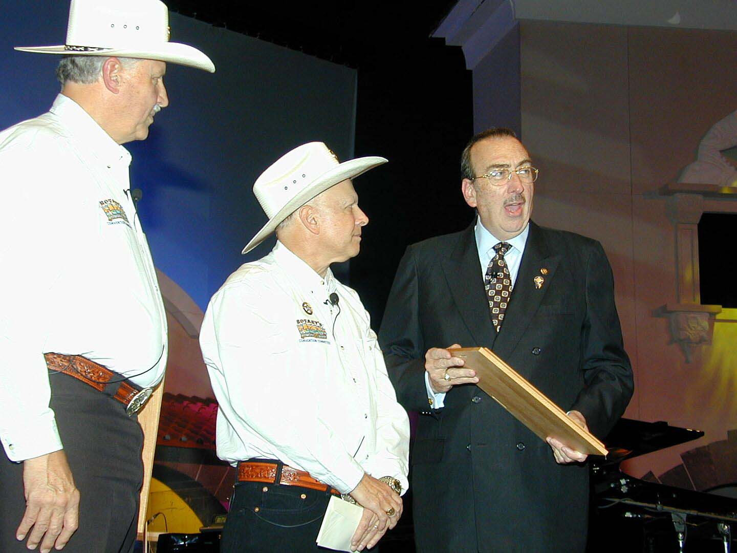 (L-R) Sonny Brown, Jim Berg and Frank Devlyn onstage during the Closing Ceremony